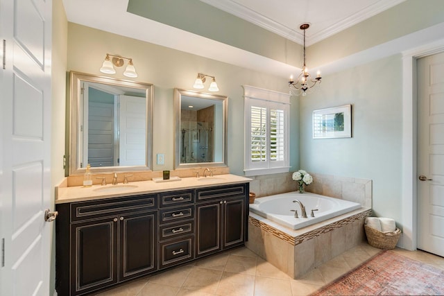 1527 Wando View St, Charleston, SC 29492 - bathroom with tile patterned floors, a stall shower, a garden tub, a chandelier, and crown molding