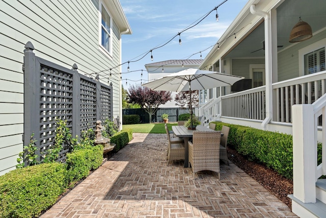 1527 Wando View St, Charleston, SC 29492 - view of patio / terrace featuring outdoor dining space and fence