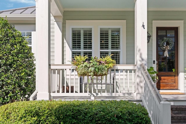 1527 Wando View St, Charleston, SC 29492 - entrance to property with covered porch, a standing seam roof, and metal roof
