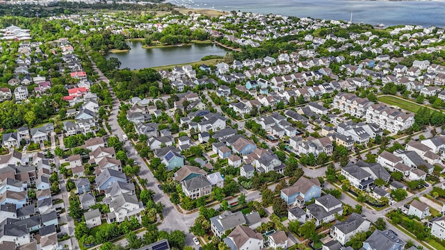aerial view featuring a water view and a residential view