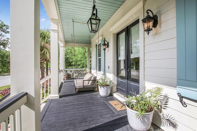 wooden deck with covered porch
