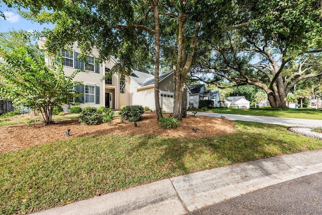 view of front of home with a front lawn