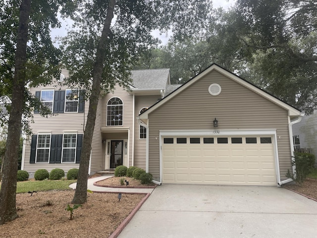 view of front of home featuring a garage