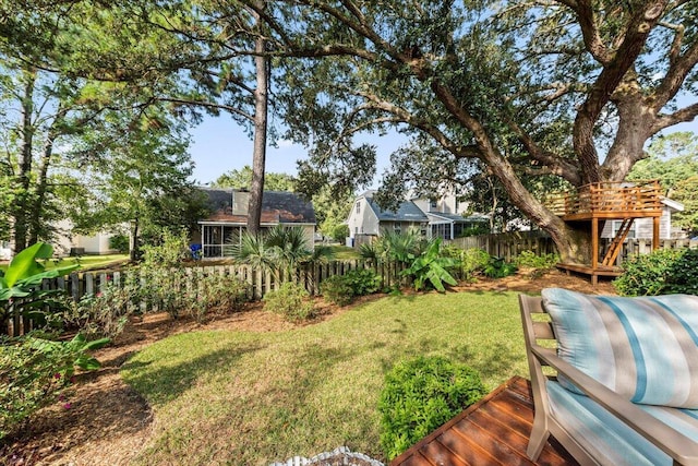 view of yard featuring a wooden deck