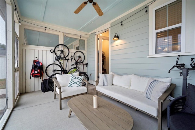 exterior space featuring an outdoor living space and ceiling fan