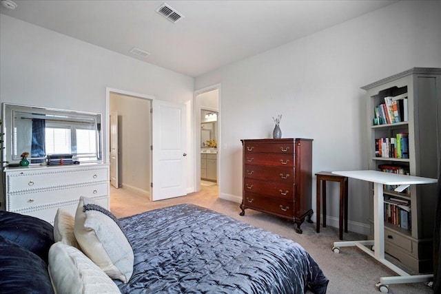 bedroom featuring light colored carpet