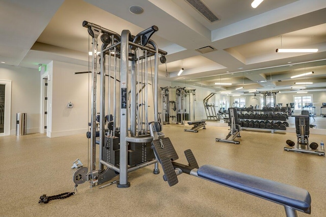 gym with coffered ceiling