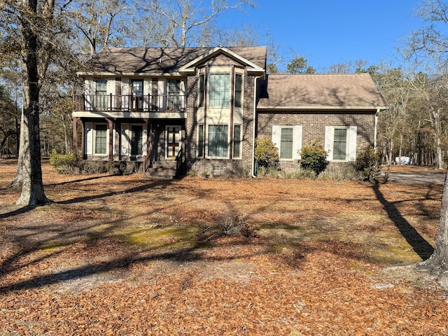 view of front of home with brick siding