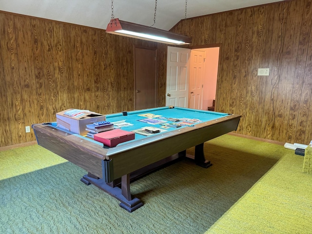 rec room with lofted ceiling, carpet floors, baseboards, and wooden walls