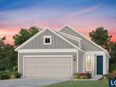 view of front of property with an attached garage, concrete driveway, and board and batten siding