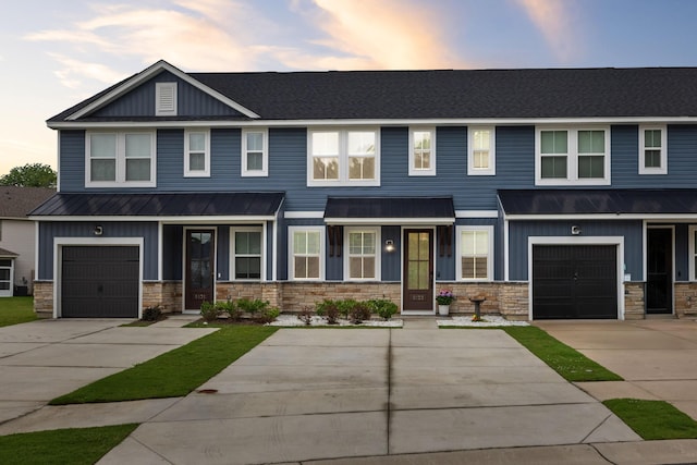 5133 Park Creek Ave, North Charleston, SC 29418 - townhome / multi-family property with concrete driveway, metal roof, stone siding, and board and batten siding