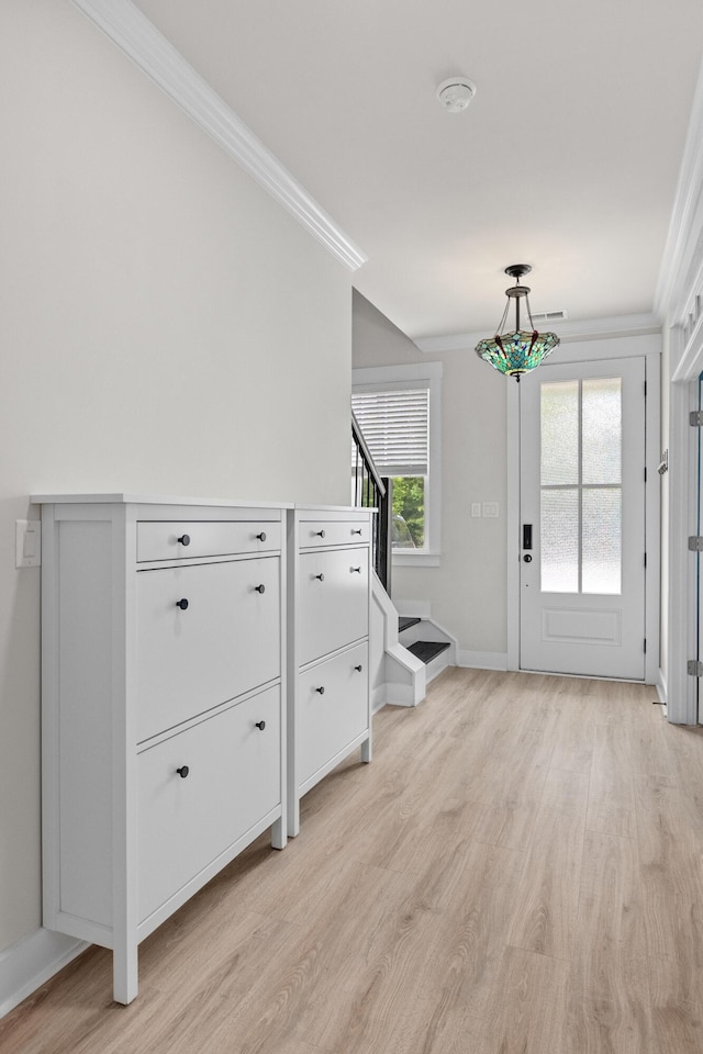 5133 Park Creek Ave, North Charleston, SC 29418 - entrance foyer with ornamental molding, light wood finished floors, baseboards, and stairs