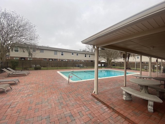 415 Parkdale Dr Unit 6D, Charleston, SC 29414 - community pool featuring a patio area and a fenced backyard