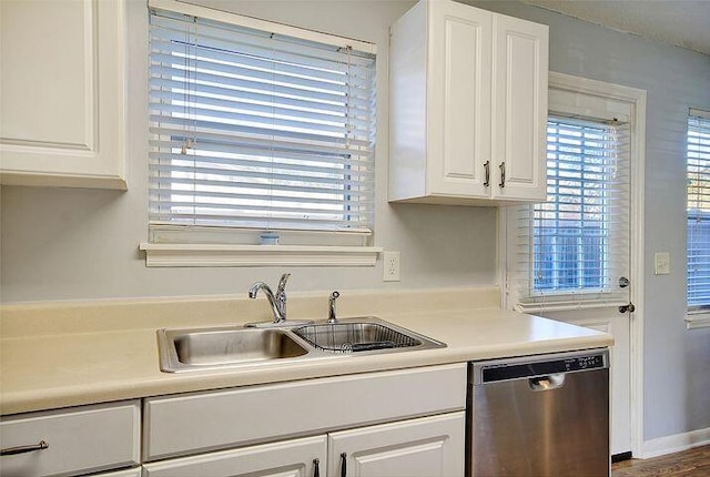 415 Parkdale Dr Unit 6D, Charleston, SC 29414 - kitchen with stainless steel dishwasher, white cabinetry, and light countertops