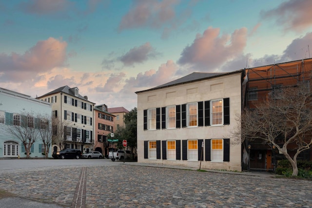 view of property at dusk