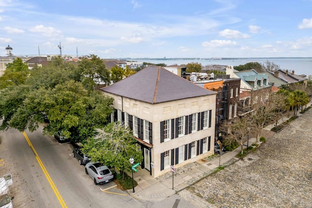 birds eye view of property featuring a water view