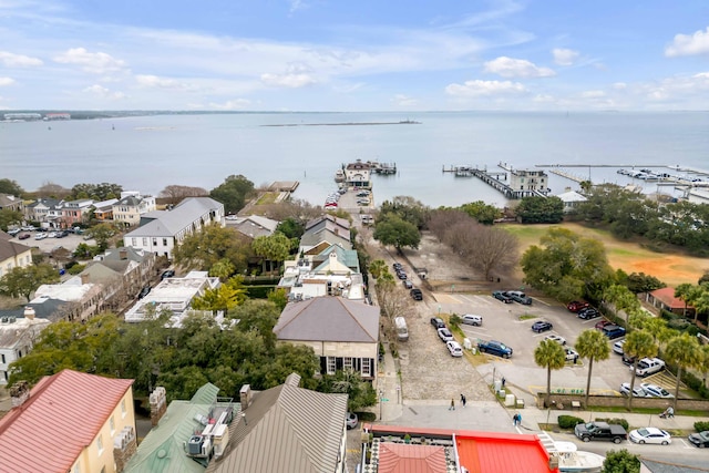 birds eye view of property featuring a water view and a residential view