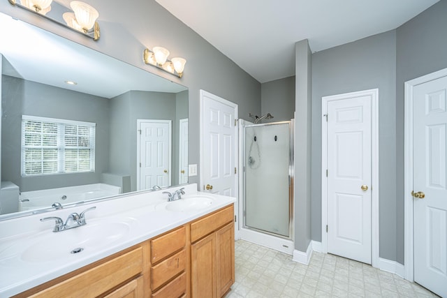 bathroom with plus walk in shower and vanity