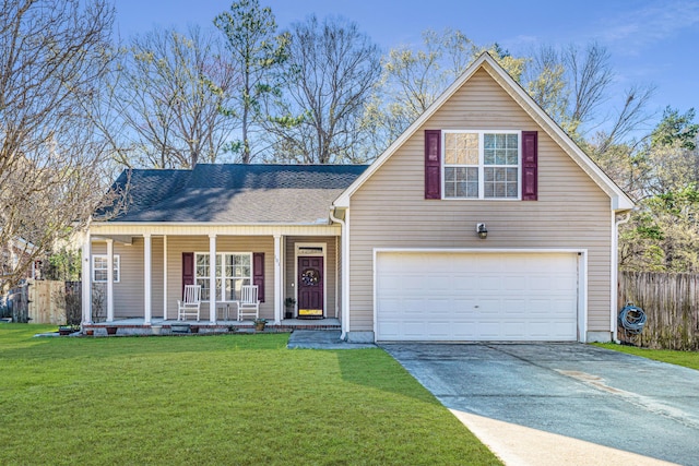 view of front of house with a garage, covered porch, and a front yard