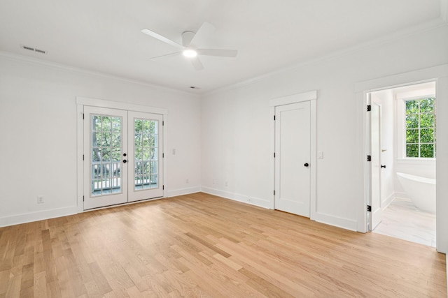 380 Tidal Reef Cir, Mount Pleasant, SC 29464 - spare room with ceiling fan, light wood-style flooring, ornamental molding, baseboards, and french doors