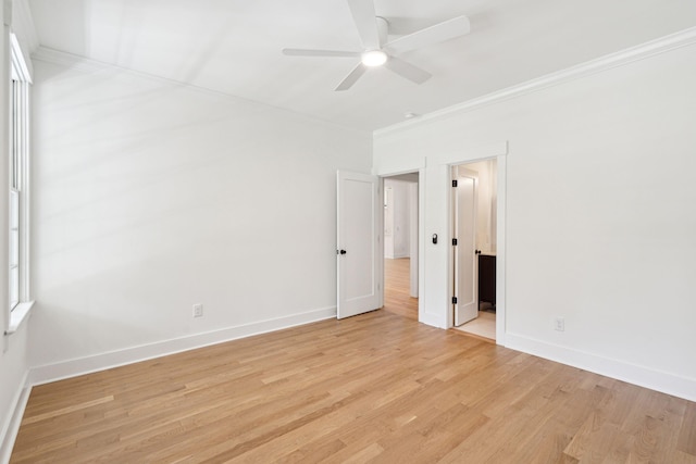 380 Tidal Reef Cir, Mount Pleasant, SC 29464 - unfurnished bedroom with crown molding, light wood-style flooring, baseboards, and a ceiling fan