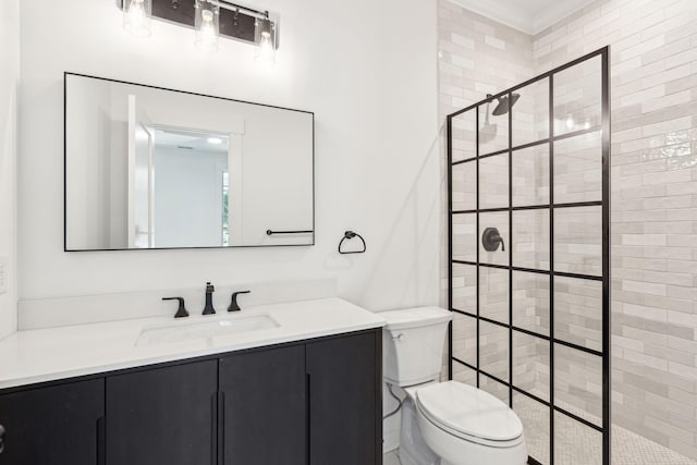 380 Tidal Reef Cir, Mount Pleasant, SC 29464 - bathroom with a tile shower, toilet, vanity, and ornamental molding