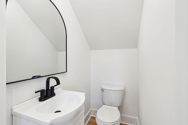 380 Tidal Reef Cir, Mount Pleasant, SC 29464 - bathroom with a sink, vaulted ceiling, toilet, and baseboards