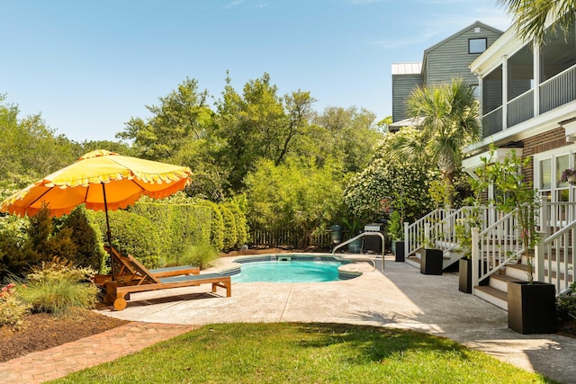 pool with a patio area