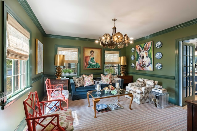 sitting room with crown molding, carpet flooring, and an inviting chandelier