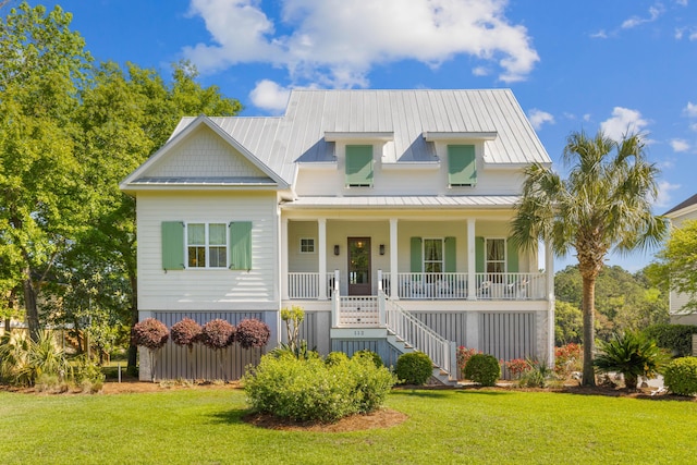 112 Berkshire Dr, Wando, SC 29492 - view of front facade with a standing seam roof, a front lawn, a porch, and stairway