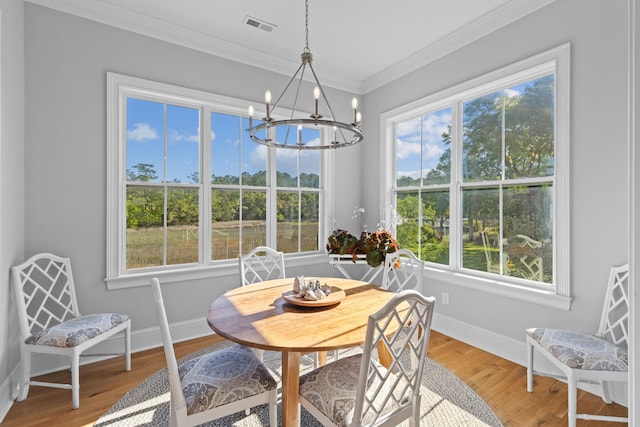 112 Berkshire Dr, Wando, SC 29492 - dining space featuring a notable chandelier, visible vents, and plenty of natural light