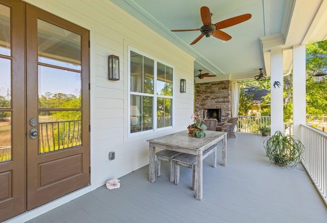 112 Berkshire Dr, Wando, SC 29492 - view of patio featuring an outdoor stone fireplace, a ceiling fan, and french doors