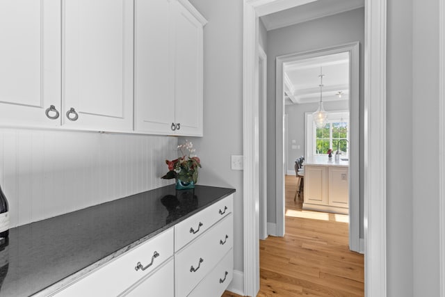 112 Berkshire Dr, Wando, SC 29492 - bar featuring light wood-style floors and crown molding