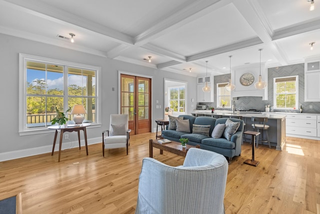 112 Berkshire Dr, Wando, SC 29492 - living room featuring light wood-style floors, beamed ceiling, coffered ceiling, and visible vents