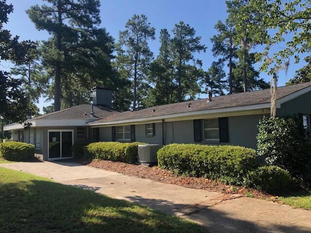 1205 Cypress Pointe Unit A205, Manning, SC 29102 - back of house with central air condition unit and a chimney