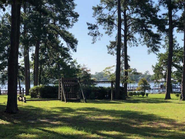 1205 Cypress Pointe Unit A205, Manning, SC 29102 - view of green lawn with a water view