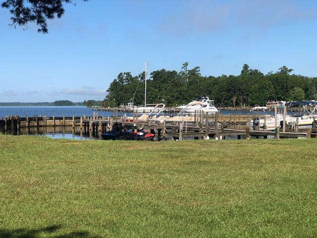 1205 Cypress Pointe Unit A205, Manning, SC 29102 - dock area featuring a water view and a lawn