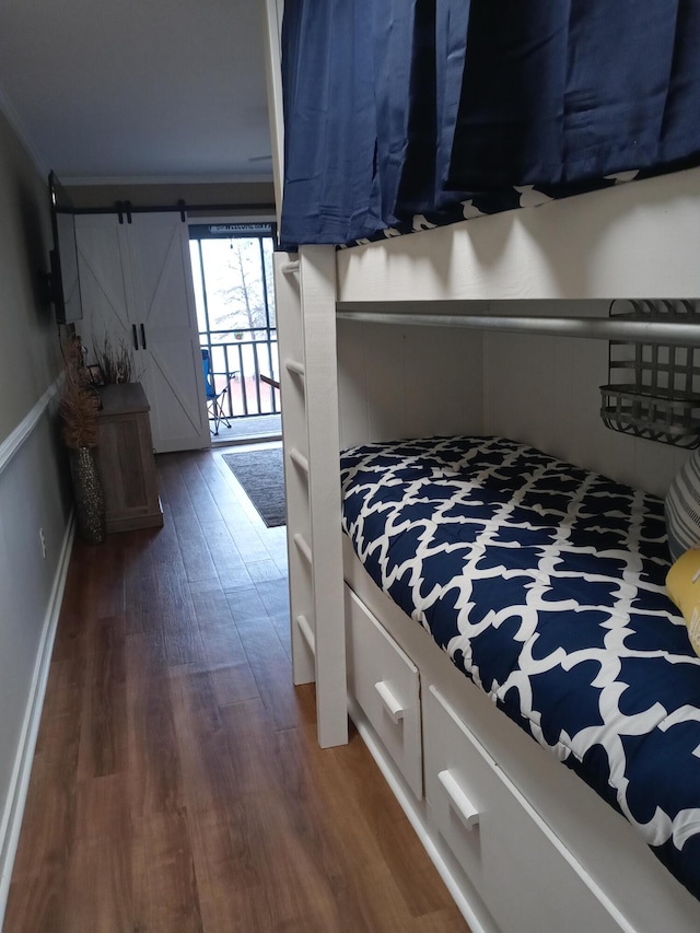 1205 Cypress Pointe Unit A205, Manning, SC 29102 - bedroom featuring wood finished floors and ornamental molding