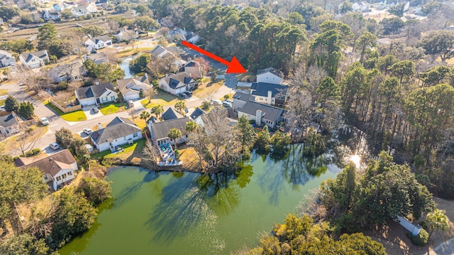 bird's eye view featuring a water view and a residential view