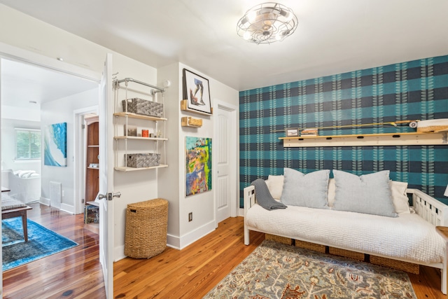 bedroom with wood-type flooring