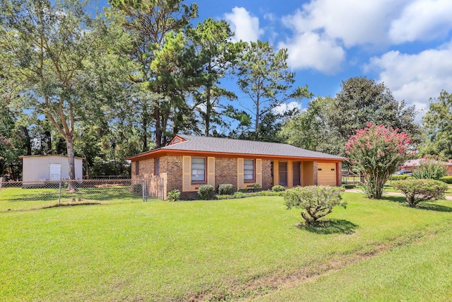 ranch-style home featuring a front yard