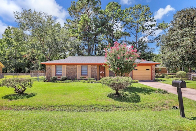 single story home featuring a garage and a front lawn