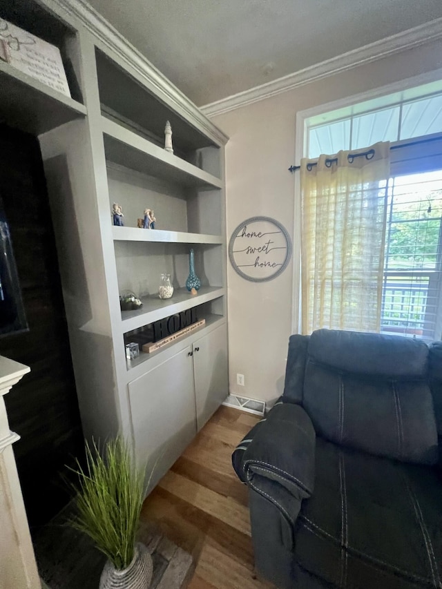 1173 Penny Creek Dr, Ruffin, SC 29475 - living area with crown molding and wood finished floors