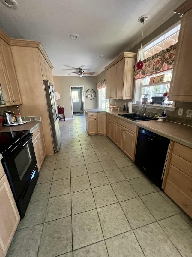 1173 Penny Creek Dr, Ruffin, SC 29475 - kitchen with black appliances, light brown cabinets, light tile patterned floors, a peninsula, and crown molding