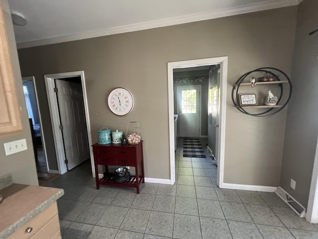 1173 Penny Creek Dr, Ruffin, SC 29475 - hallway with crown molding and light tile patterned flooring