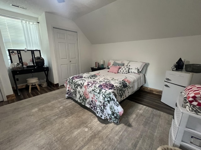 1173 Penny Creek Dr, Ruffin, SC 29475 - bedroom featuring wood finished floors, lofted ceiling, and a closet