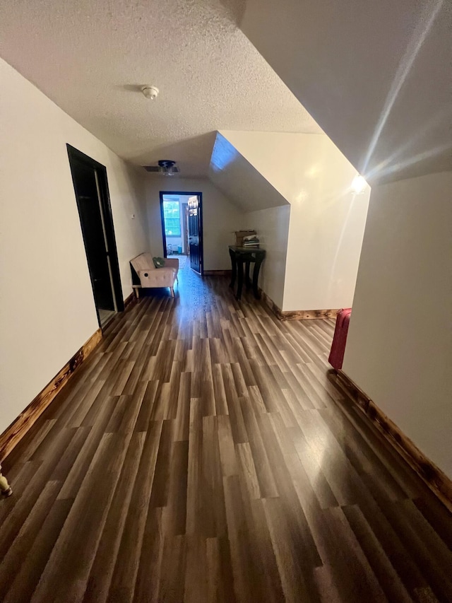 1173 Penny Creek Dr, Ruffin, SC 29475 - bonus room featuring wood finished floors, a textured ceiling, and vaulted ceiling