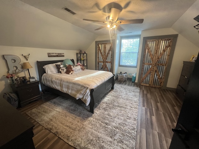 1173 Penny Creek Dr, Ruffin, SC 29475 - bedroom with vaulted ceiling, wood finished floors, a textured ceiling, and a ceiling fan
