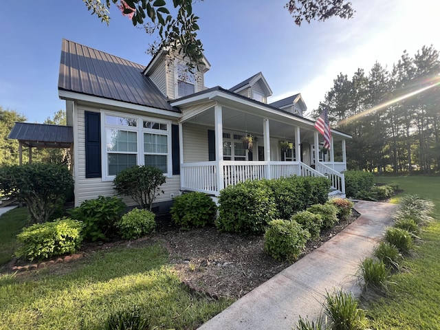 1173 Penny Creek Dr, Ruffin, SC 29475 - view of front of home with covered porch and a metal roof