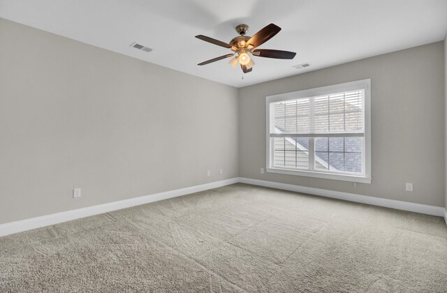 102 Brutus Ln, Summerville, SC 29485 - spare room with baseboards, carpet flooring, ceiling fan, and visible vents